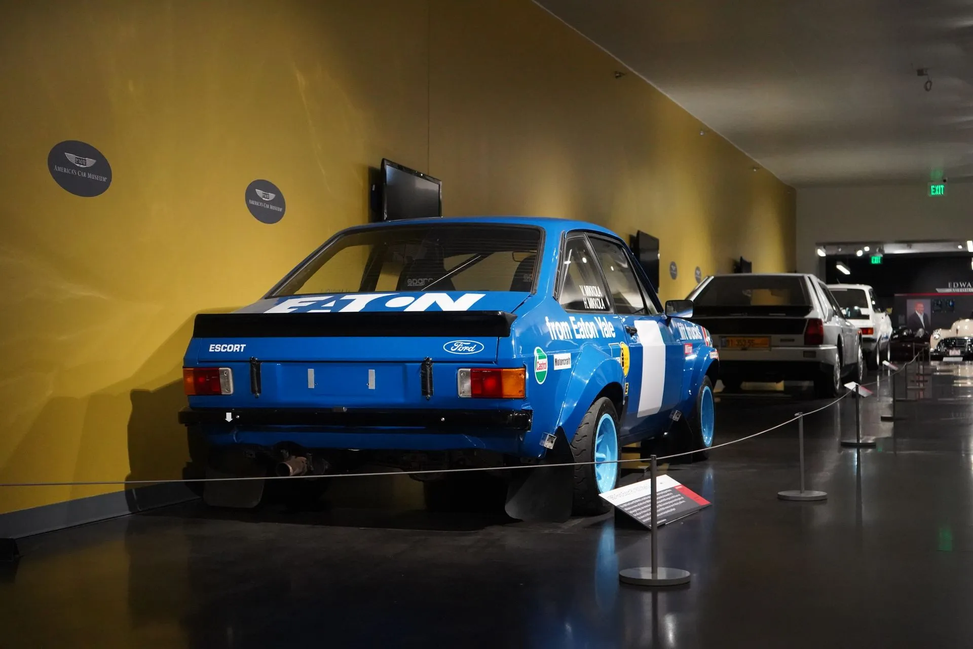 Cars and motorcycles displayed inside America's Car Museum
